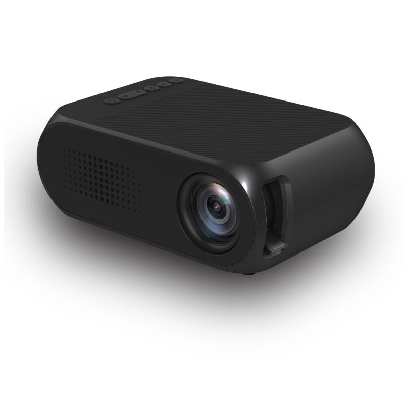 Mini proyector portátil de color negro sobre una superficie blanca